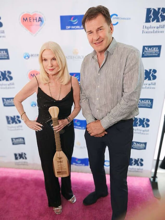 daphne barak with golf legend nick faldo